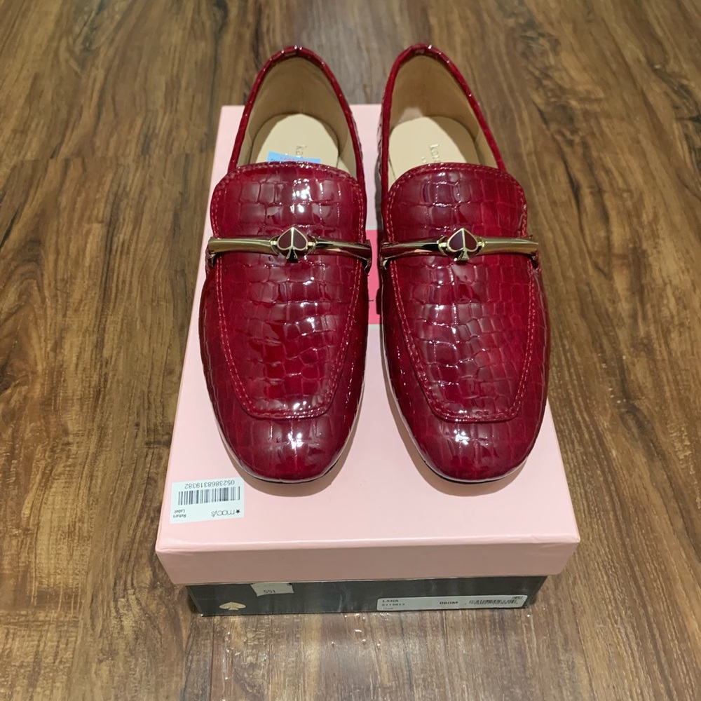 A gorgeous wine colored patent leather loafer.